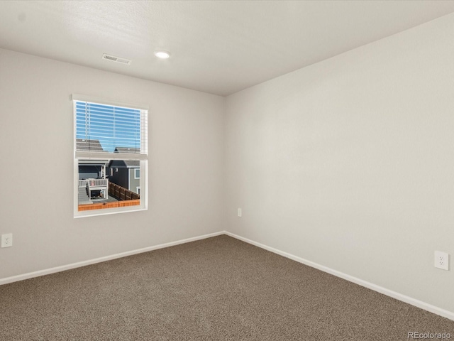 view of carpeted spare room