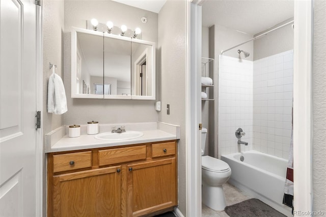 full bathroom featuring toilet, shower / tub combo, a textured wall, tile patterned floors, and vanity