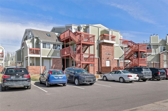970 S Dawson Way Unit 15, Aurora, CO 80012 - view of building exterior featuring uncovered parking