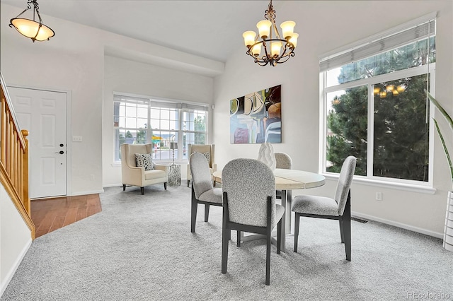 10115 Foxridge Ct, Highlands Ranch, CO 80126 - dining room featuring carpet flooring and a chandelier