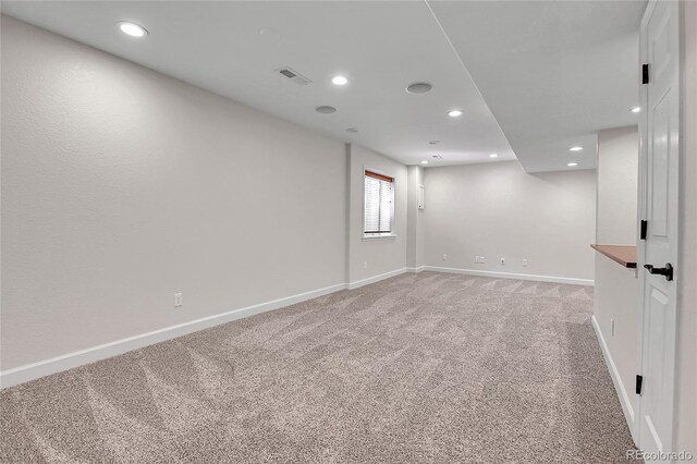 10115 Foxridge Ct, Highlands Ranch, CO 80126 - spare room featuring light colored carpet and recessed lighting
