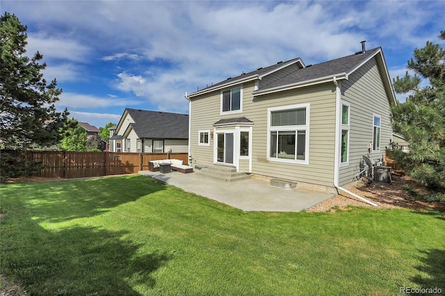 10115 Foxridge Ct, Highlands Ranch, CO 80126 - back of property with a patio, an outdoor living space, and entry steps