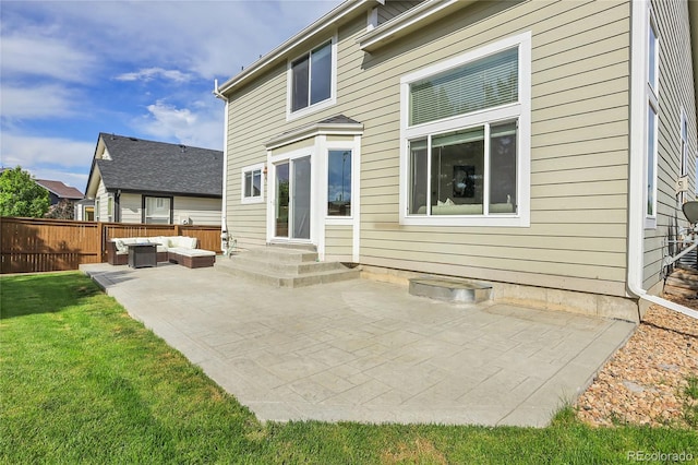 10115 Foxridge Ct, Highlands Ranch, CO 80126 - back of house featuring an outdoor hangout area and a patio area