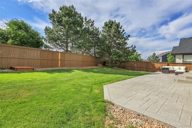 10115 Foxridge Ct, Highlands Ranch, CO 80126 - fenced backyard with a patio area and an outdoor living space