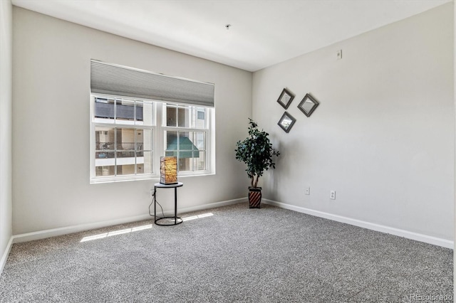 empty room with carpet flooring