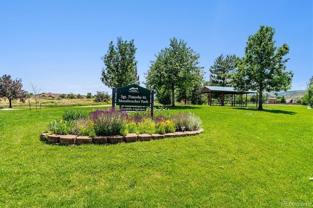 exterior space featuring a gazebo and a yard