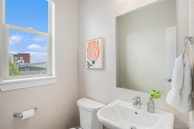 9072 E 47th Ave, Denver, CO 80238 - half bath with a sink and toilet