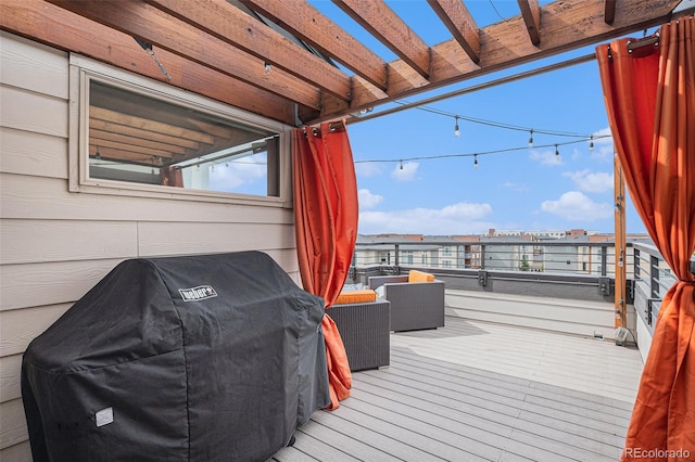 9072 E 47th Ave, Denver, CO 80238 - wooden terrace with area for grilling and a pergola