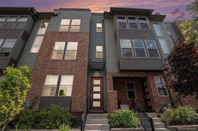 9072 E 47th Ave, Denver, CO 80238 - townhome / multi-family property with brick siding