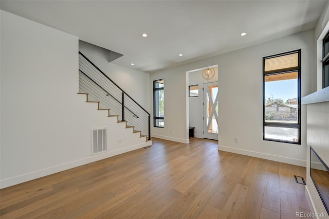 414 E Arkansas St, Buena Vista, CO 81211 - entryway featuring plenty of natural light, wood finished floors, stairway, and recessed lighting