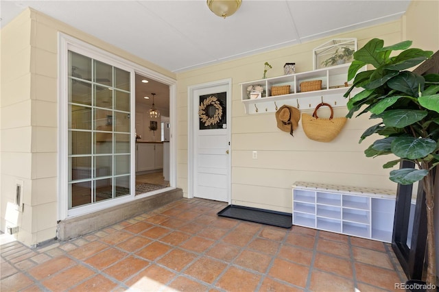view of exterior entry featuring a porch