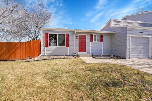 single story home featuring a garage, driveway, a front lawn, and fence