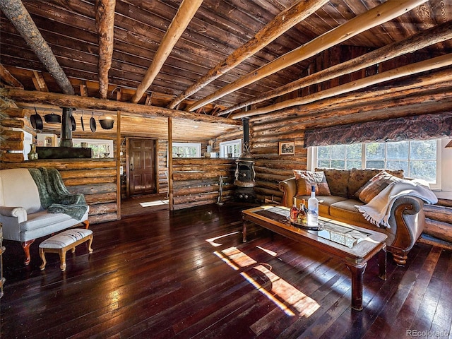 living area with wooden ceiling, rustic walls, beam ceiling, and hardwood / wood-style floors