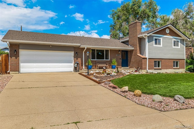 10009 Dodge Dr, Northglenn, CO 80260 - split level home featuring brick siding, concrete driveway, an attached garage, and a chimney