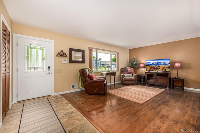 10009 Dodge Dr, Northglenn, CO 80260 - living room with plenty of natural light and wood finished floors