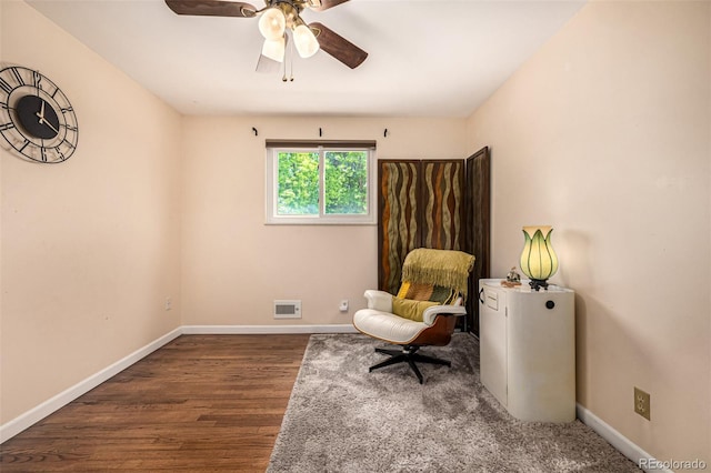 10009 Dodge Dr, Northglenn, CO 80260 - sitting room with wood finished floors and ceiling fan
