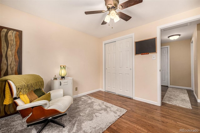 10009 Dodge Dr, Northglenn, CO 80260 - sitting room featuring wood finished floors and a ceiling fan