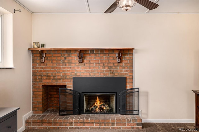 10009 Dodge Dr, Northglenn, CO 80260 - detailed view of a brick fireplace, a ceiling fan, and carpet floors