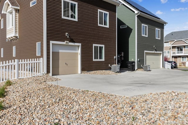 5383 Andes St, Denver, CO 80249 - view of property exterior with driveway and an attached garage