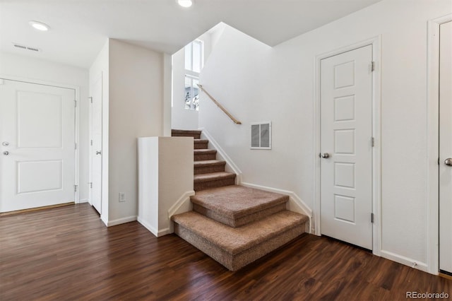 5383 Andes St, Denver, CO 80249 - stairway featuring wood finished floors and recessed lighting