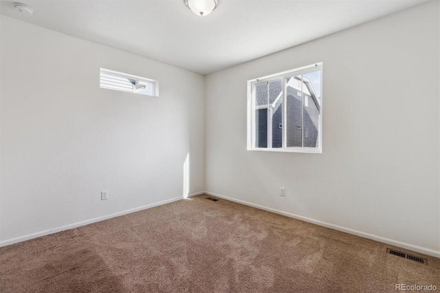 5383 Andes St, Denver, CO 80249 - empty room featuring carpet floors and a smoke detector