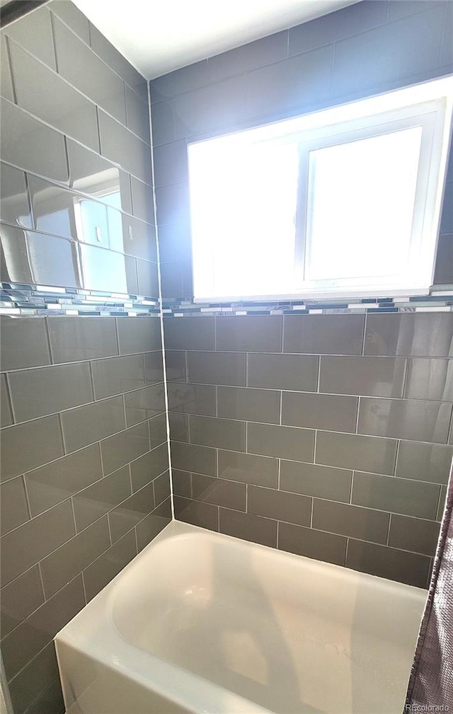 bathroom featuring tub / shower combination