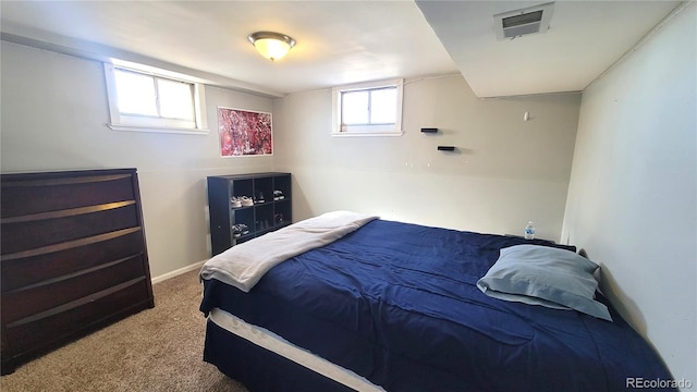 bedroom with carpet and visible vents