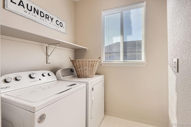 laundry room with washing machine and dryer