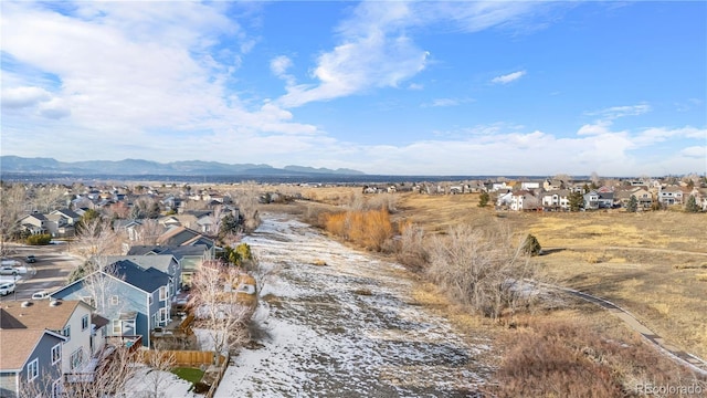 bird's eye view with a mountain view