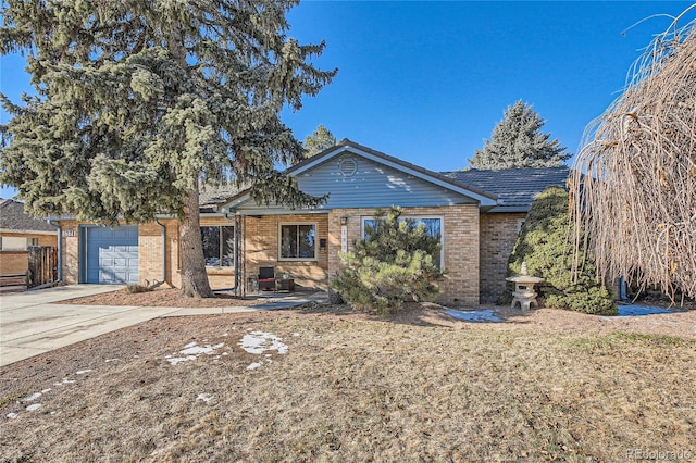 ranch-style house featuring a garage