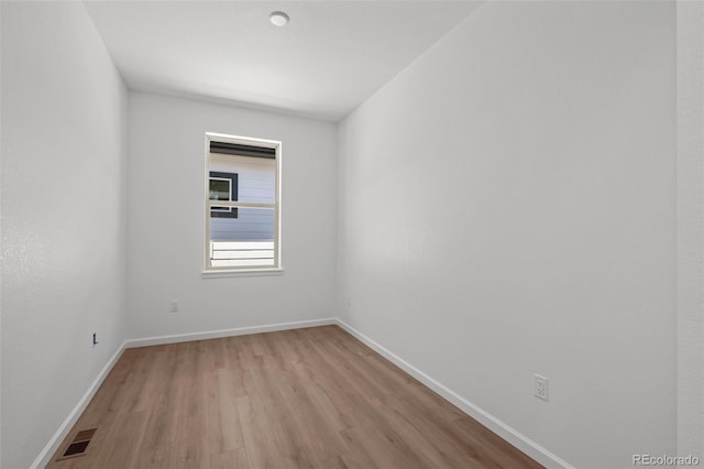 11341 W Alder Dr, Littleton, CO 80127 - empty room with light wood finished floors and baseboards