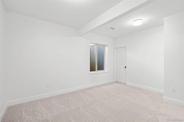 11341 W Alder Dr, Littleton, CO 80127 - unfurnished room with light colored carpet and beam ceiling