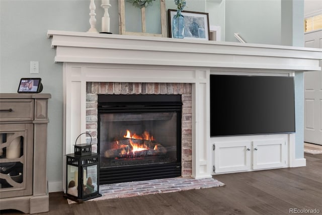 8318 Devinney Ct, Arvada, CO 80005 - detailed view of a fireplace and wood finished floors