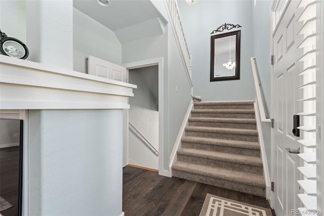 8318 Devinney Ct, Arvada, CO 80005 - stairs featuring wood finished floors and baseboards