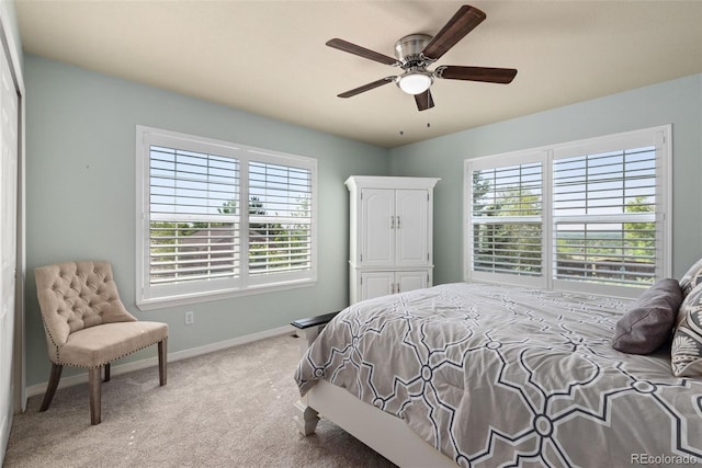 8318 Devinney Ct, Arvada, CO 80005 - carpeted bedroom featuring multiple windows and ceiling fan