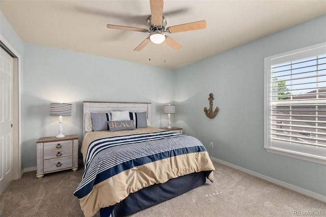 8318 Devinney Ct, Arvada, CO 80005 - bedroom with carpet, a closet, and a ceiling fan