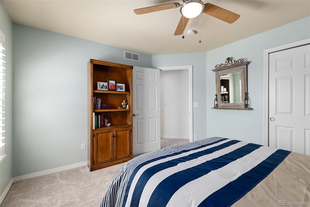 8318 Devinney Ct, Arvada, CO 80005 - bedroom featuring light carpet and a ceiling fan