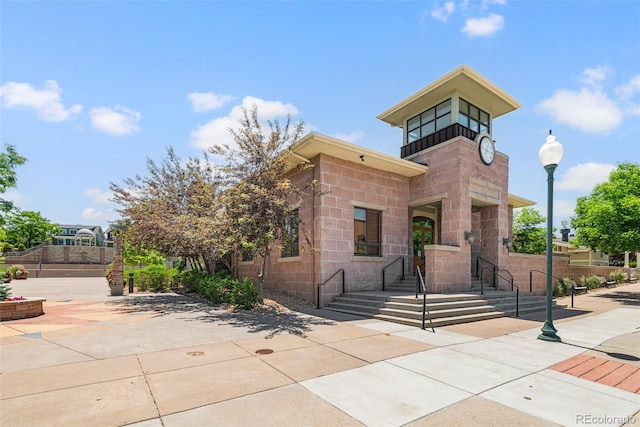 8318 Devinney Ct, Arvada, CO 80005 - modern home featuring stone siding