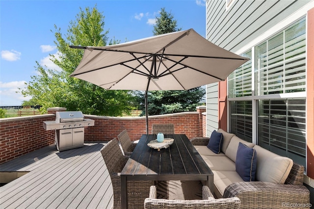 8318 Devinney Ct, Arvada, CO 80005 - deck with outdoor dining area and grilling area