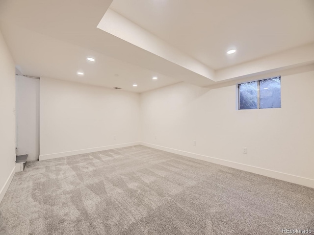 basement featuring carpet flooring