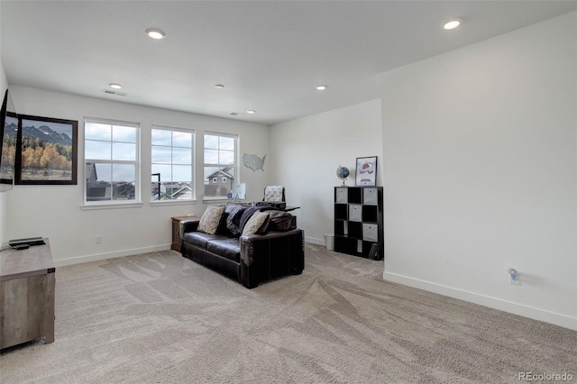 22593 E Piccolo Way, Aurora, CO 80016 - living area featuring light carpet, baseboards, and recessed lighting