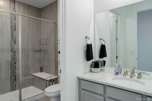 22593 E Piccolo Way, Aurora, CO 80016 - full bathroom with a stall shower, toilet, and vanity