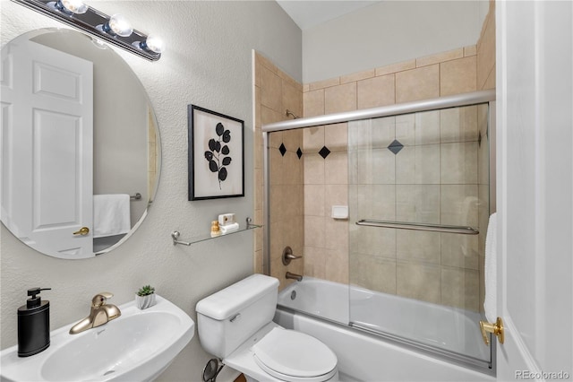 45 N Ogden St Unit 201, Denver, CO 80218 - bathroom featuring enclosed tub / shower combo and a textured wall