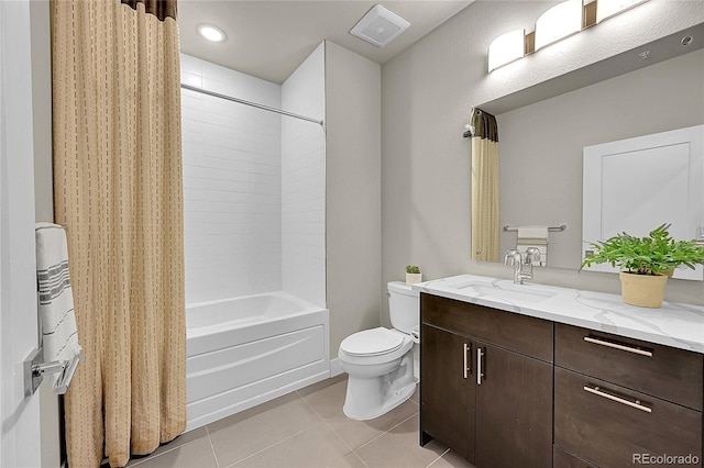 bathroom featuring visible vents, vanity, toilet, tile patterned floors, and shower / tub combo