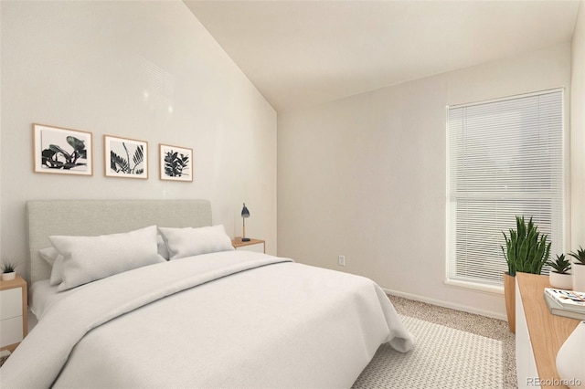 carpeted bedroom with lofted ceiling