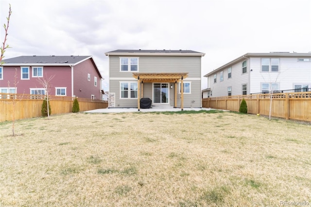 back of house with a fenced backyard, a pergola, a lawn, and a patio