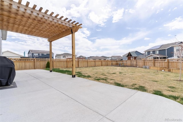 view of patio with a residential view, a fenced backyard, grilling area, and a pergola