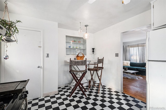 7887 Quivas Way, Denver, CO 80221 - dining space with tile patterned floors