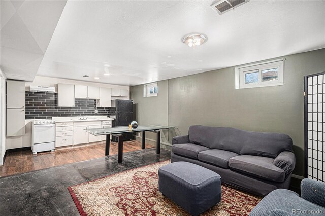 7887 Quivas Way, Denver, CO 80221 - living room with wood finished floors