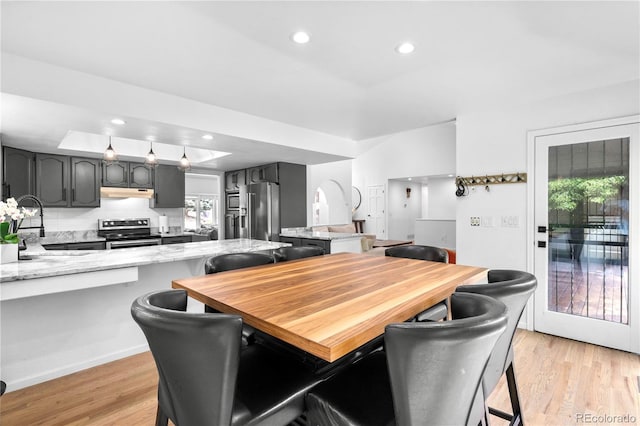 3253 S King Way, Denver, CO 80236 - dining area with light wood finished floors and recessed lighting